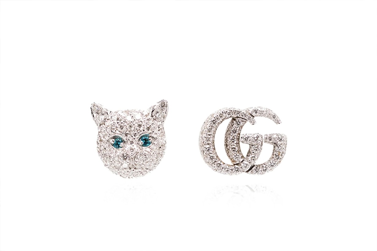 gucci logo earrings white cat head and gold diamond