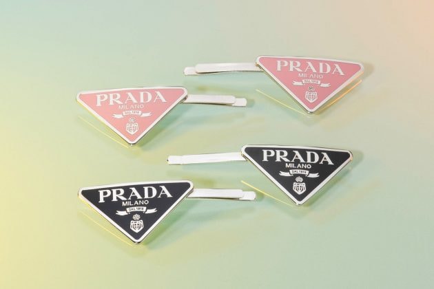 prada accessory hair pin clip airpods case tokyo pop up