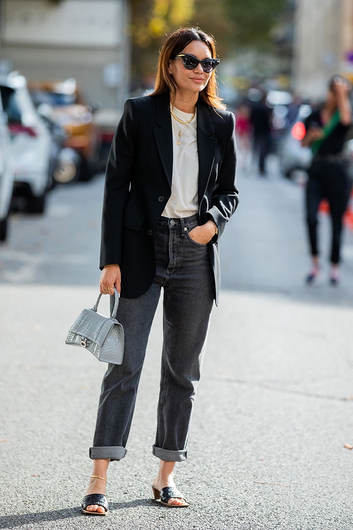Balenciaga bag blazer and jeans street style