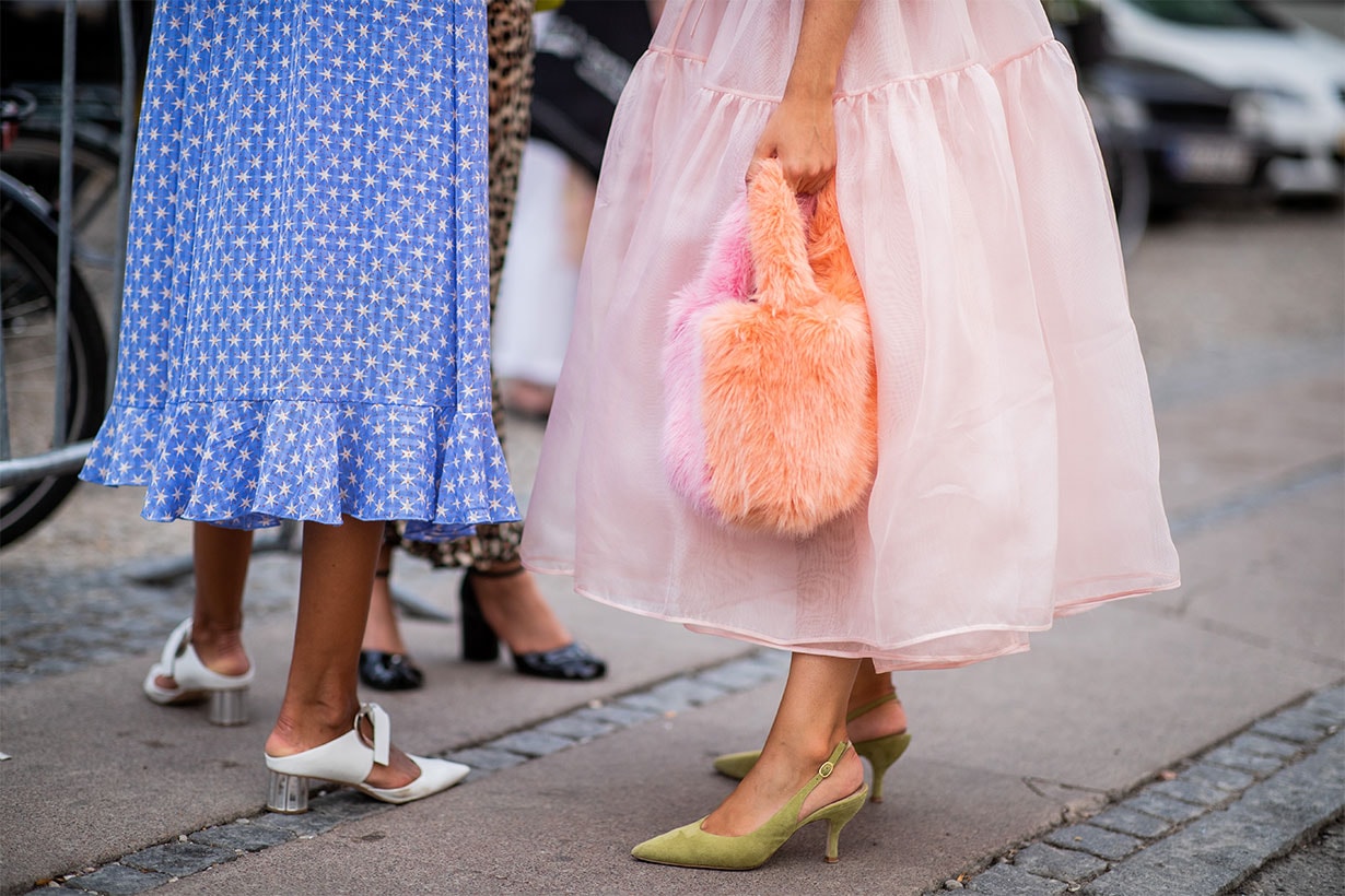 A guest wearing a bag is seen outside Stine Goya during the Copenhagen Fashion Week Spring/Summer 2019 on August 8, 2018 in Copenhagen, Denmark.
