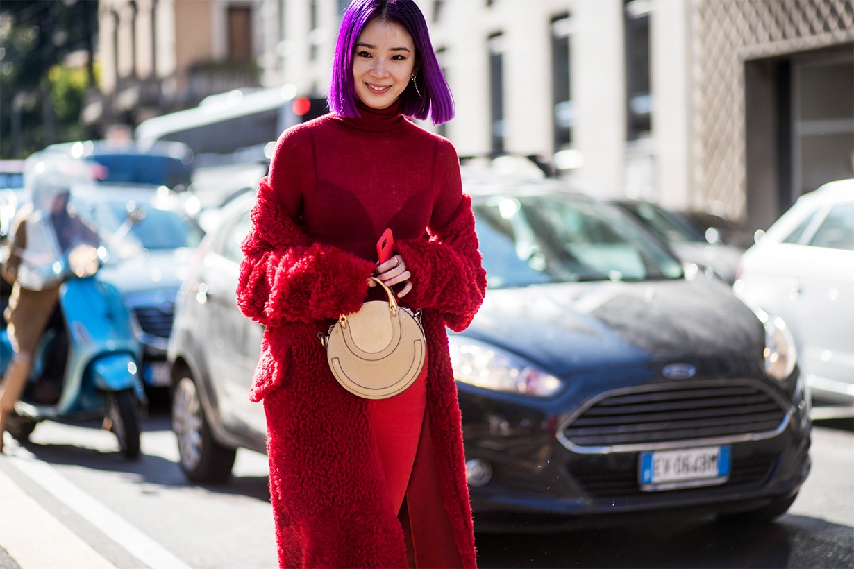 Irene Kim wearing red coat, red turtleneck is seen outside Max Mara during Milan Fashion Week Spring/Summer 2018