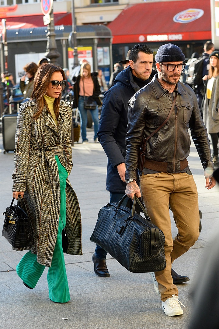 Victoria Beckham and David Beckham with Hermes Birkin Bag and Bottega Veneta Bag