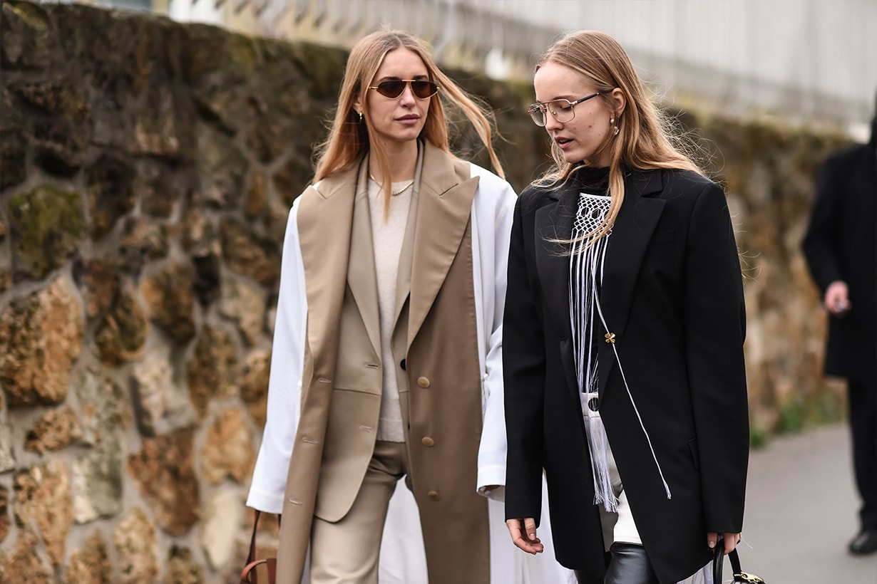 Pernille Teisbaek and Alexandra Carl are seen outside the Loewe show during Paris Fashion Week: AW20 on February 28, 2020 in Paris, France.
