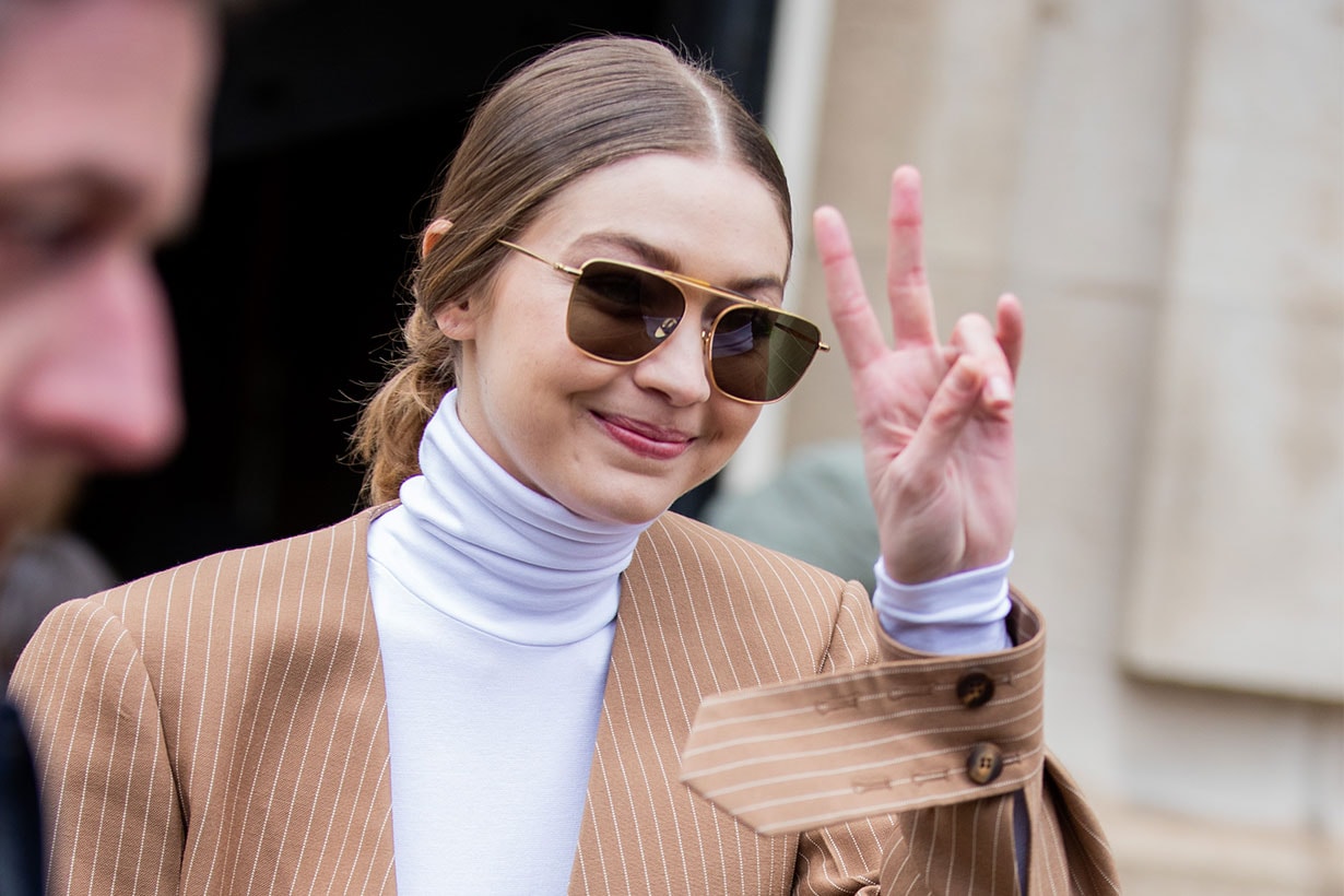 Gigi Hadid is seen wearing camel blazer and asymmetric pants outside Chloe during Paris Fashion Week Womenswear Fall/Winter 2020/2021 : Day Four on February 27, 2020 in Paris, France.