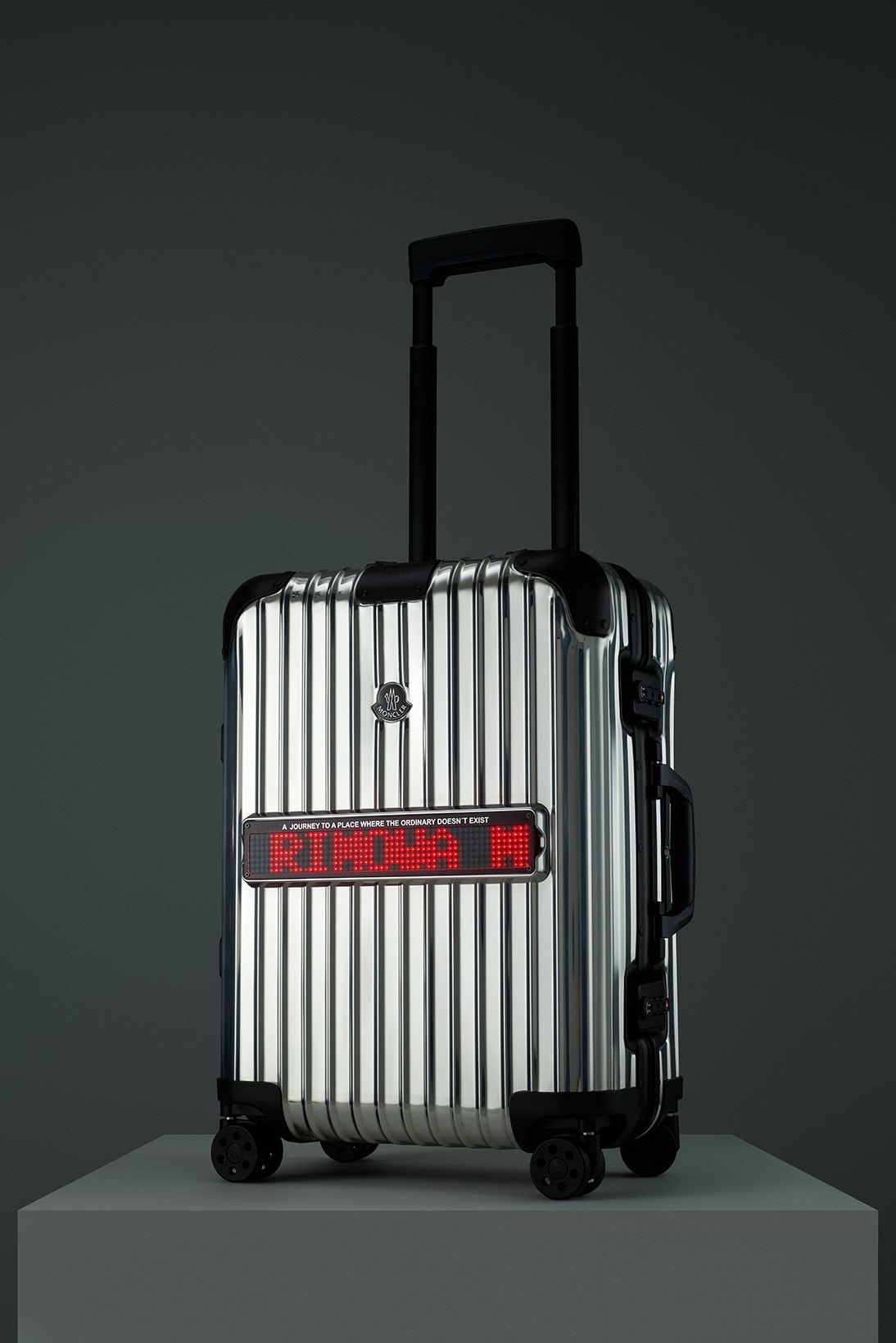 rimowa moncler genius reflection collaboration suitcase luggage