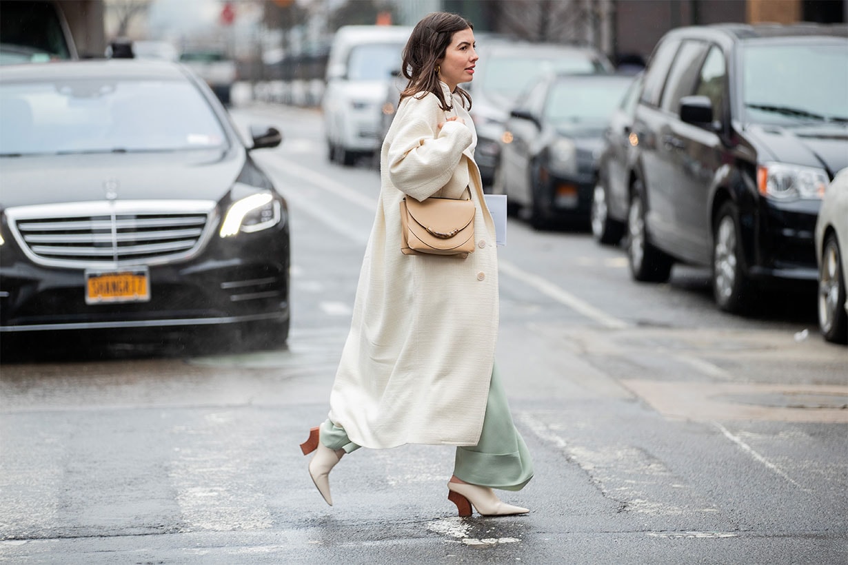 Kat Collings is seen wearing creme white coat, beige bag outside Gabriela Hearst during New York Fashion Week Fall / Winter on February 11, 2020 in New York City.