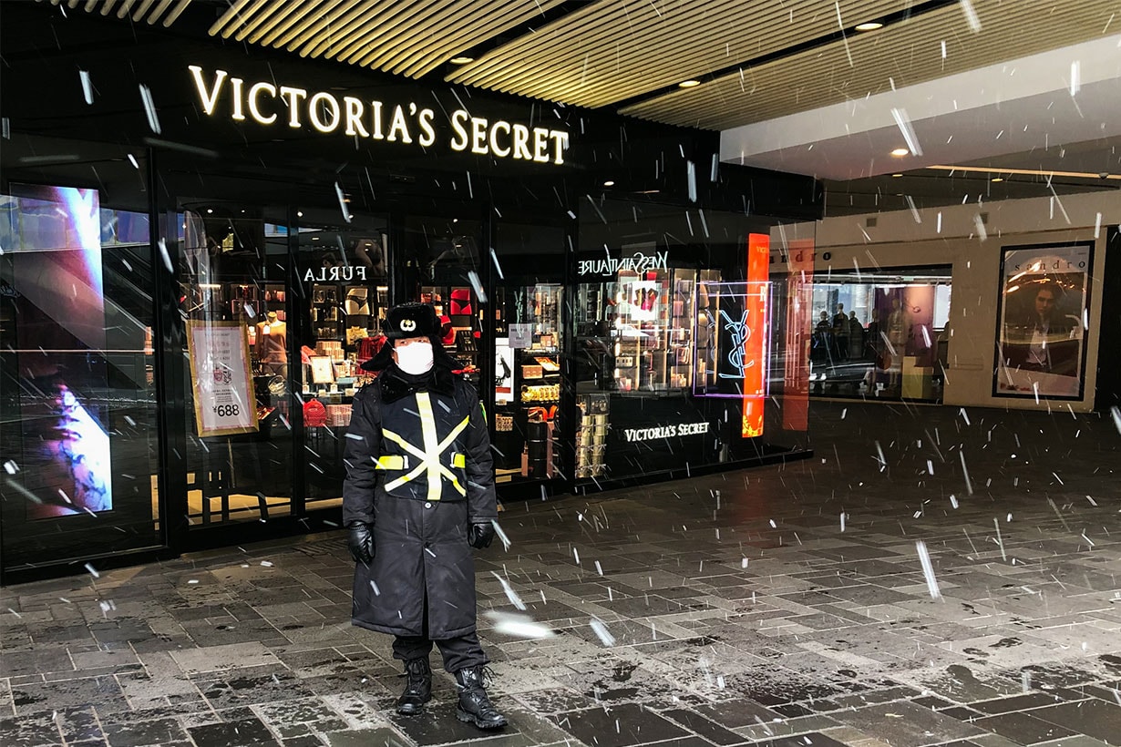  A security staff worker in a facemask stands outside a Victoria's Secret shop; China has witnessed an outbreak of the 2019-nCoV coronavirus, which started in Wuhan