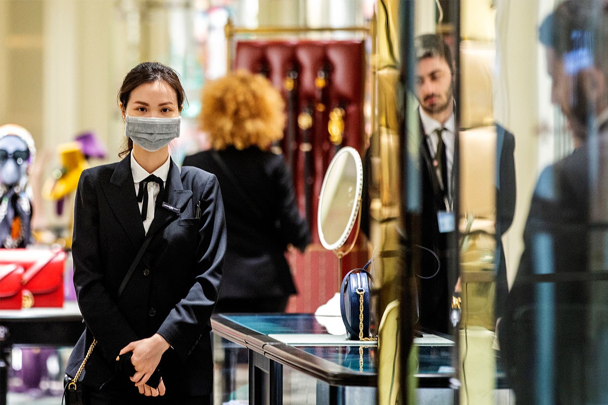 Shop assistants in luxury outlets in Sydney's CBD are seen wearing masks on January 31, 2020 in Sydney, Australia.