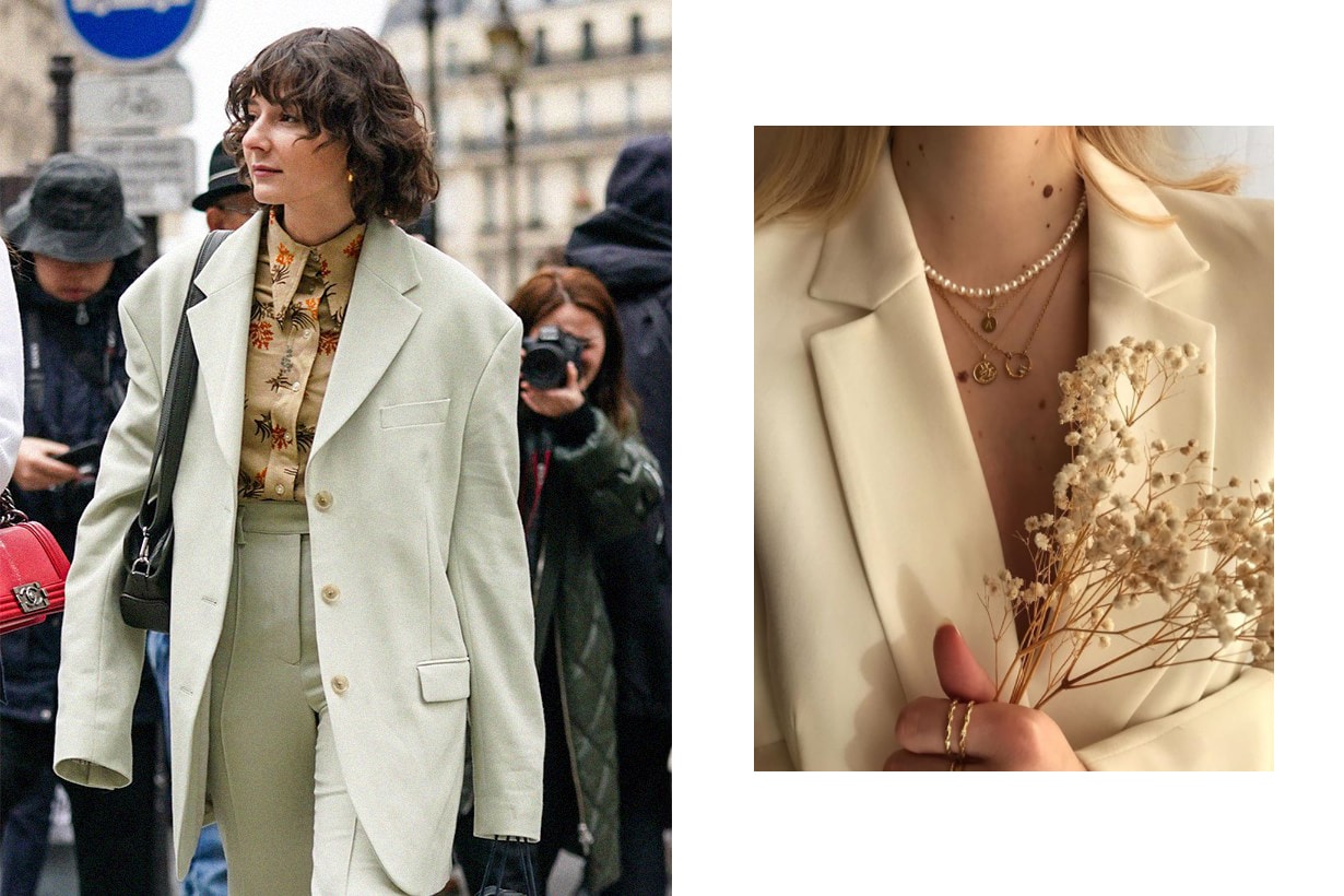 Alyssa Coscarelli wears earrings, a sand-color shirt with floral print, a light green oversized jacket, light green pants, a black bag, outside Nina Ricci, during Paris Fashion Week - Womenswear Fall/Winter 2020/2021, on February 28, 2020 in Paris, France.