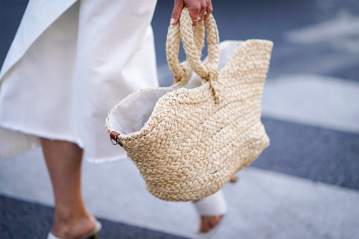 A basket bag made of straw , outside Schiaparelli, during Paris Fashion Week Haute Couture Fall Winter 2018/2019, on July 2, 2018 in Paris, France. 