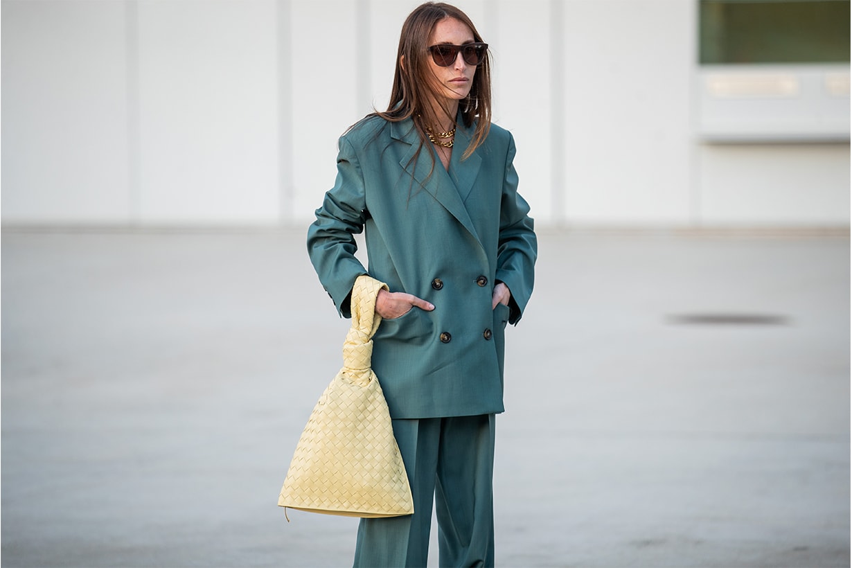 Chloe Harrouche seen wearing green suit, yellow twist bag Bottega Veneta, sandals outside Jacquemus during Paris Fashion Week - Menswear F/W 2020-2021 on January 18, 2020 in Paris, France.
