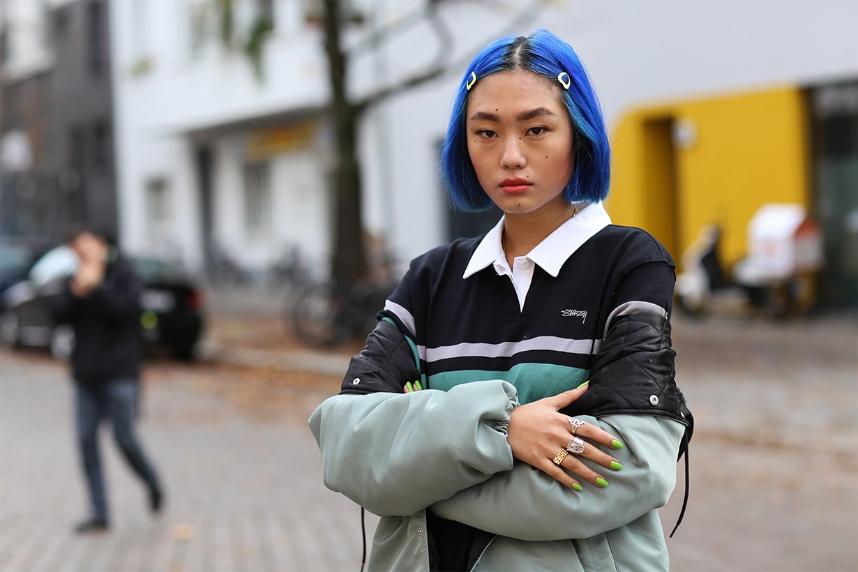 Kicki Yang Zhang wearing a Stussy jacket and shirt on November 14, 2018 in Berlin, Germany. 