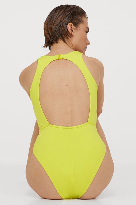 HnM crossover Women + Waves swimsuit wakesurfing and wakeboarding