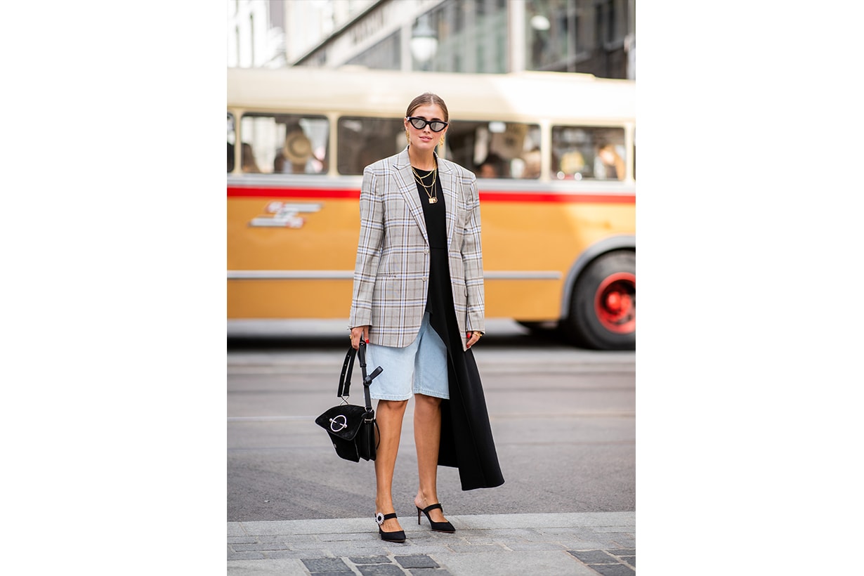 Darja Barannik wearing checked blazer is seen outside Pia Tjelta during Oslo Runway SS19 on August 15, 2018 in Oslo, Norway.