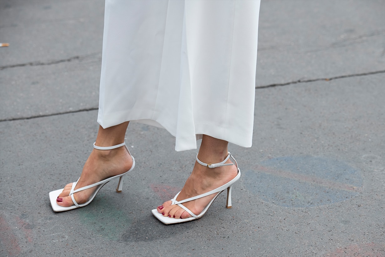 Digital influencer Caroline Daur wears Bottega Veneta shoes and Ellery trousers on September 25, 2019 in Paris, France.