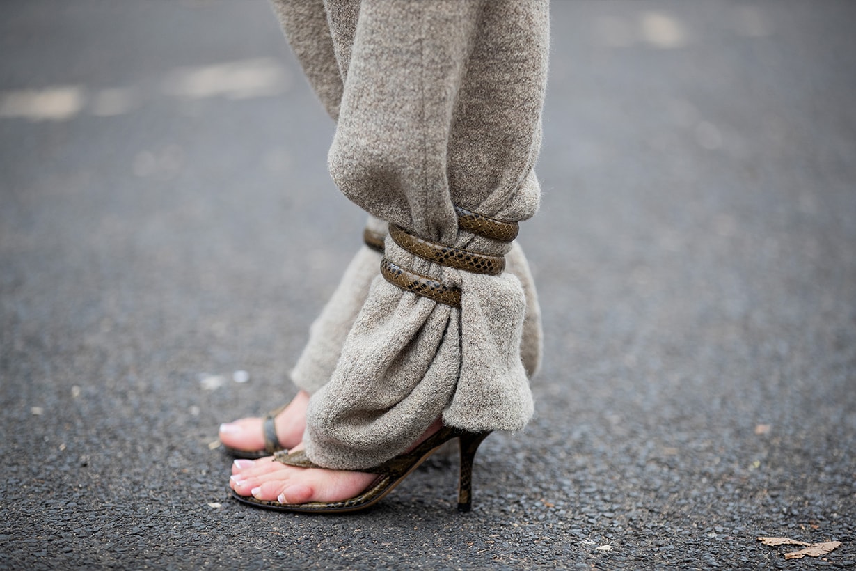 Gitta Banko is seen wearing beige pants by Boscana x Gitta Banko, python sandals with wrap around straps by Bottega Venetta on January 25, 2020 in Dusseldorf, Germany.