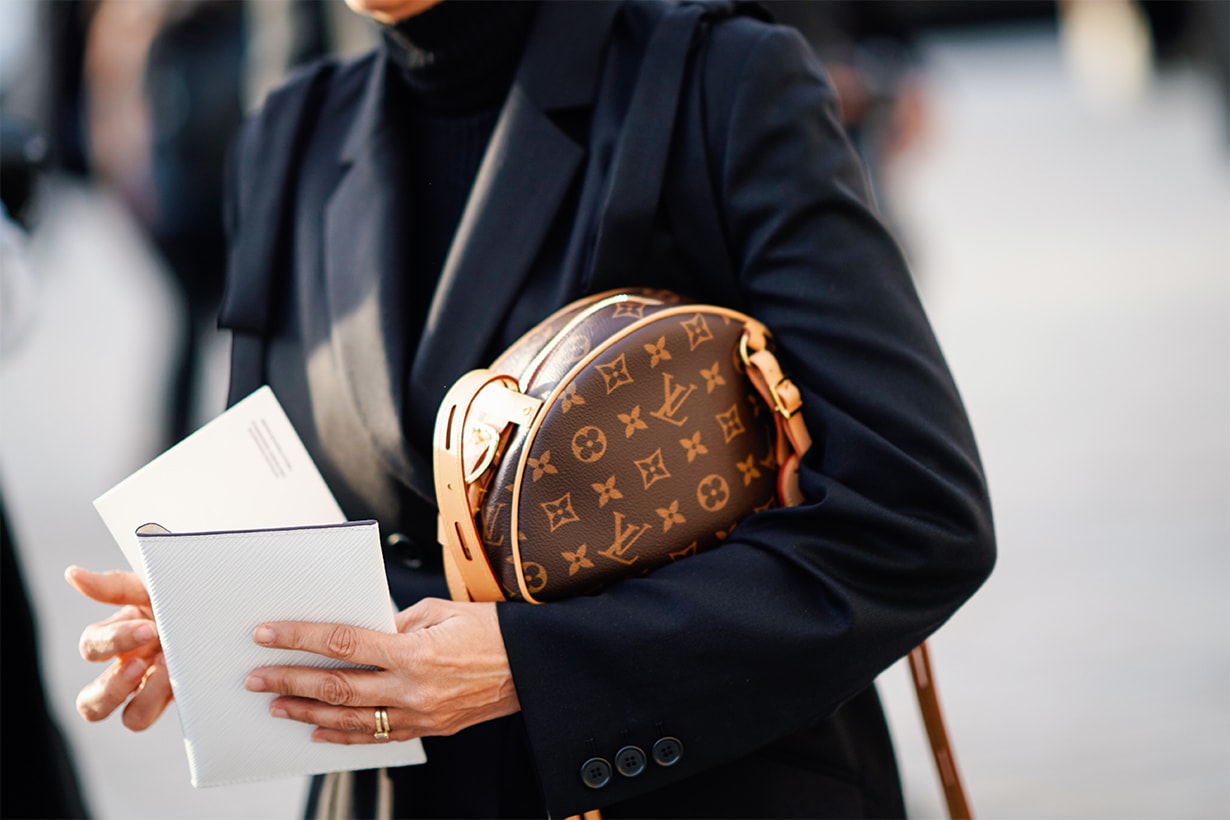 A guest wears a Louis Vuitton monogram round bag, outside Louis Vuitton, during Paris Fashion Week Womenswear Fall/Winter 2019/2020, on March 05, 2019 in Paris, France.