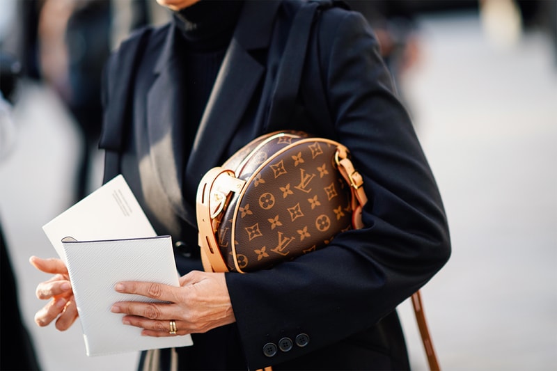A guest wears a Louis Vuitton monogram round bag, outside Louis Vuitton, during Paris Fashion Week Womenswear Fall/Winter 2019/2020, on March 05, 2019 in Paris, France.