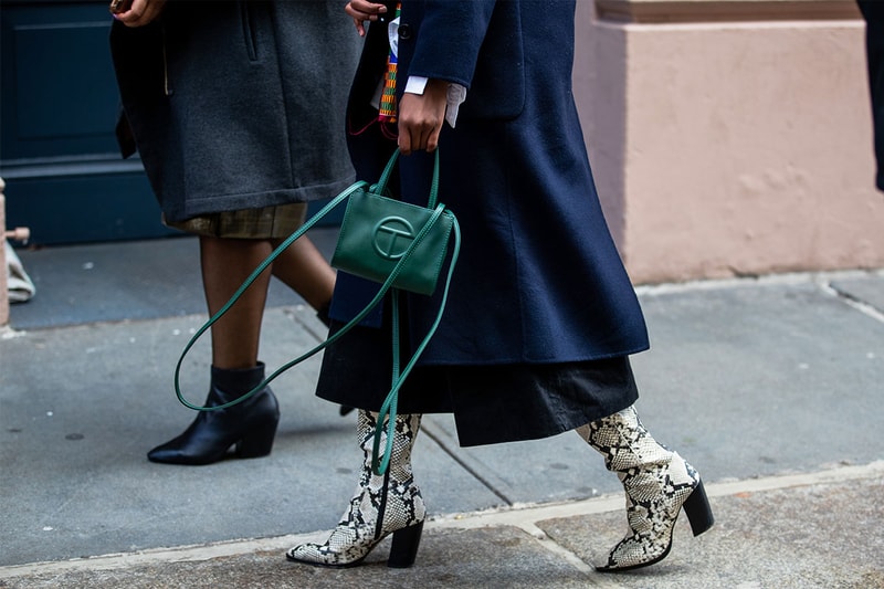 A guest is seen wearing green bag outside Tibi during New York Fashion Week Fall/Winter 20 on February 08, 2020 in New York City.