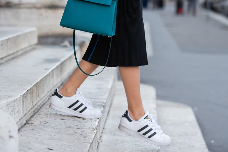 Lisa Hahnbueck is seen wearing Victoria Beckham knitted dress, Adidas superstar sneaker, Hermes Kelly bag 25 during Milan Fashion Week Fall/Winter 2020-2021 on February 22, 2020 in Milan, Italy.