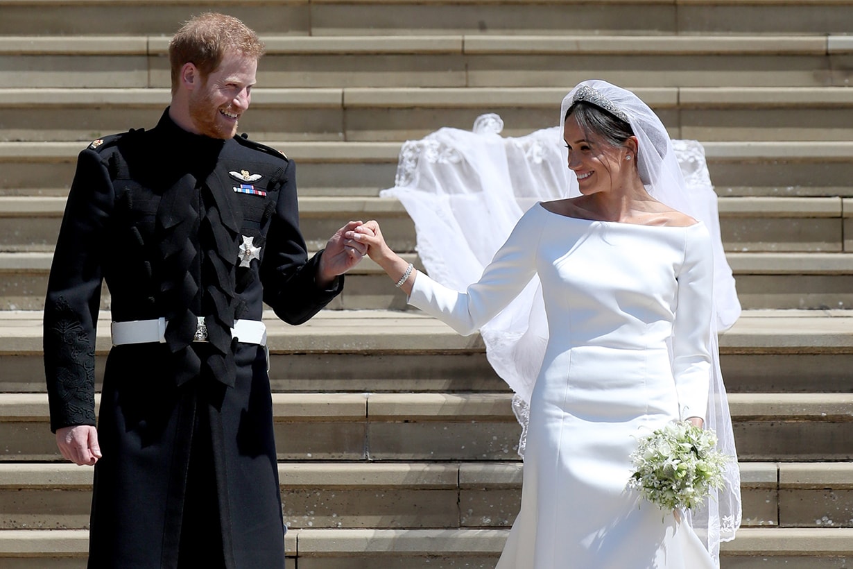 Prince Harry, Duke of Sussex and the Duchess of Sussex depart after their wedding ceremonyat St George's Chapel at Windsor Castle on May 19, 2018 in Windsor, England. 