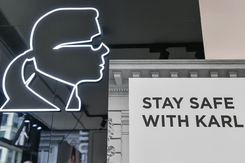 The lettering "Stay safe with Karl" can be seen in the Karl Lagerfeld Boutique on Friedrichstraße. The brand's shops have now reopened with a hygiene concept. Hand disinfectants, gloves and free face masks are also available. Photo: Jens Kalaene/dpa-Zentralbild/dpa