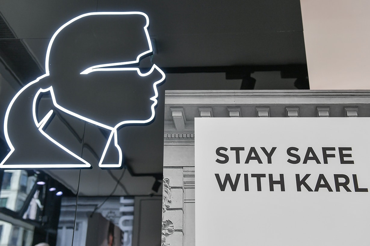 The lettering "Stay safe with Karl" can be seen in the Karl Lagerfeld Boutique on Friedrichstraße. The brand's shops have now reopened with a hygiene concept. Hand disinfectants, gloves and free face masks are also available. Photo: Jens Kalaene/dpa-Zentralbild/dpa