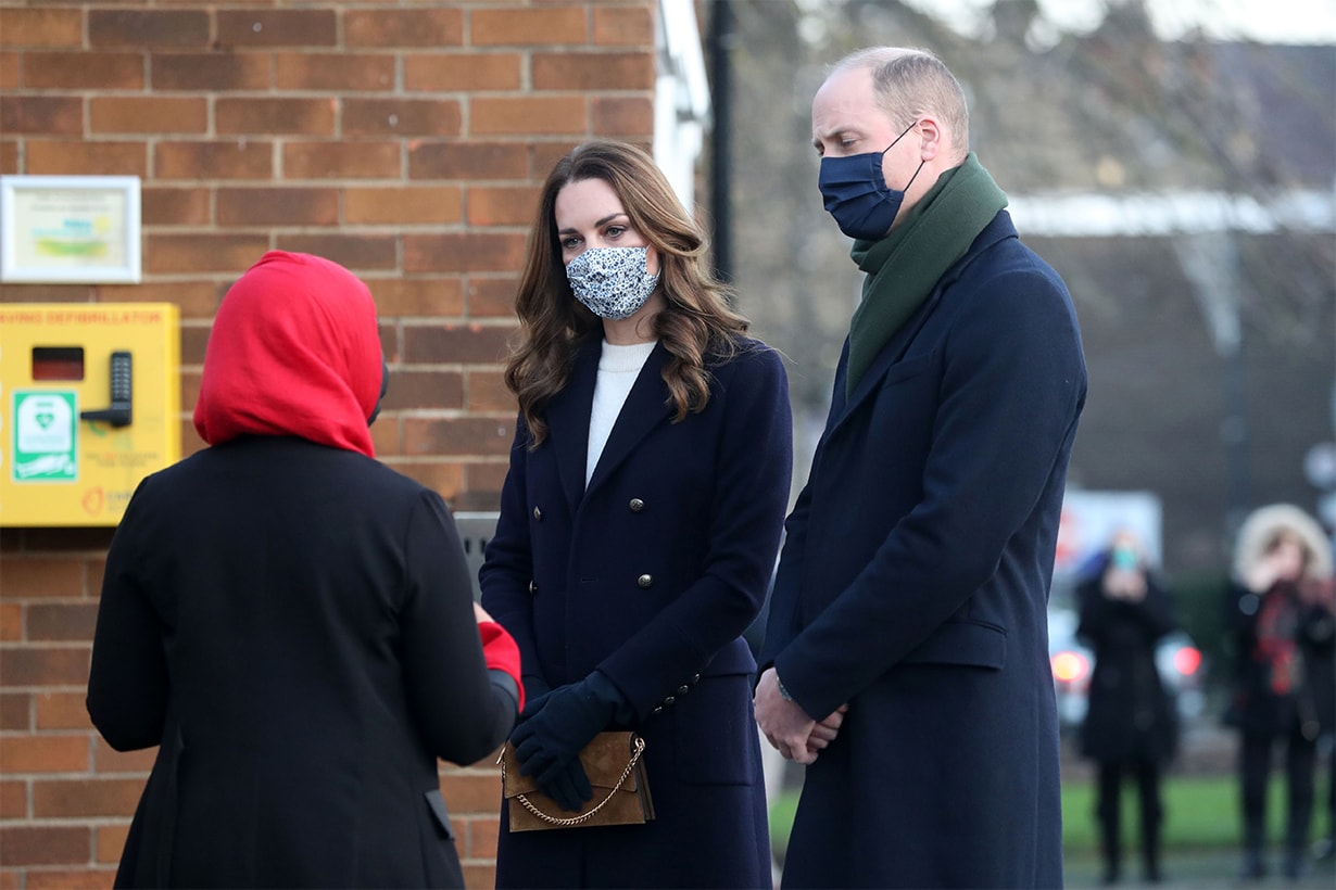 Britain's Prince William, Duke of Cambridge (R) and Britain's Catherine, Duchess of Cambridge (C) meet volunteers who have supported elderly members of their local community throughout the COVID-19 pandemic at Batley Community Centre in northern England on December 7, 2020, on their first full day of engagements on their tour of the UK. - During their trip, their Royal Highnesses hope to pay tribute to individuals, organisations and initiatives across the country that have gone above and beyond to support their local communities this year. (Photo by Danny Lawson / POOL / AFP) (Photo by
