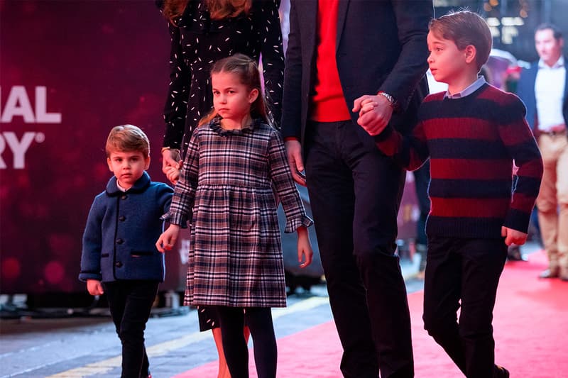 Britain's Prince William, Duke of Cambridge, his wife Britain's Catherine, Duchess of Cambridge, and their children Britain's Prince George of Cambridge (R), Britain's Princess Charlotte of Cambridge (3rd L) and Britain's Prince Louis of Cambridge (L) arrive to attend a special pantomime performance of The National Lotterys Pantoland at London's Palladium Theatre in London on December 11, 2020, to thank key workers and their families for their efforts throughout the pandemic. (Photo by Aaron Chown / POOL / AFP)