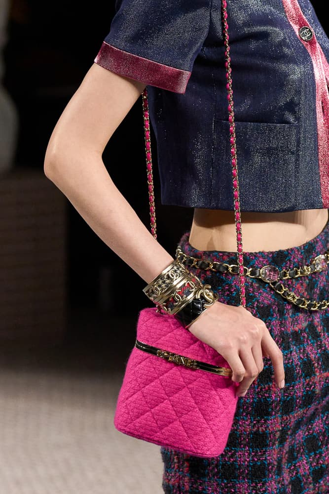 chanel fall 2022 is an ode to tweed handbags