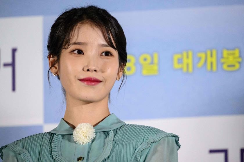 IU Photo by ANTHONY WALLACE/AFP via Getty Images