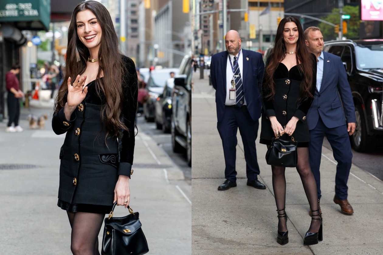 Anne Hathaway wearing a black Gianni Versace dress and carrying the black JW Pei Lucia Bag in New York in 2026