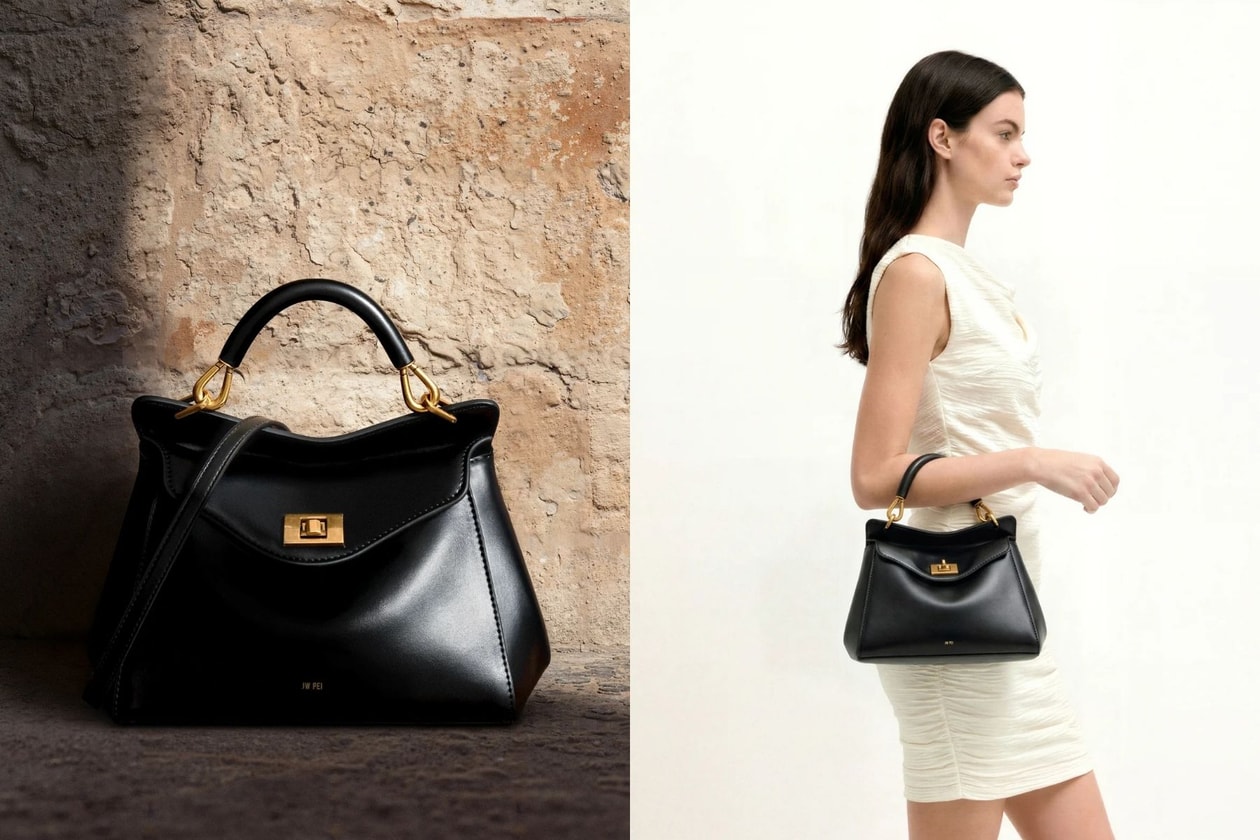 Anne Hathaway wearing a black Gianni Versace dress and carrying the black JW Pei Lucia Bag in New York in 2026