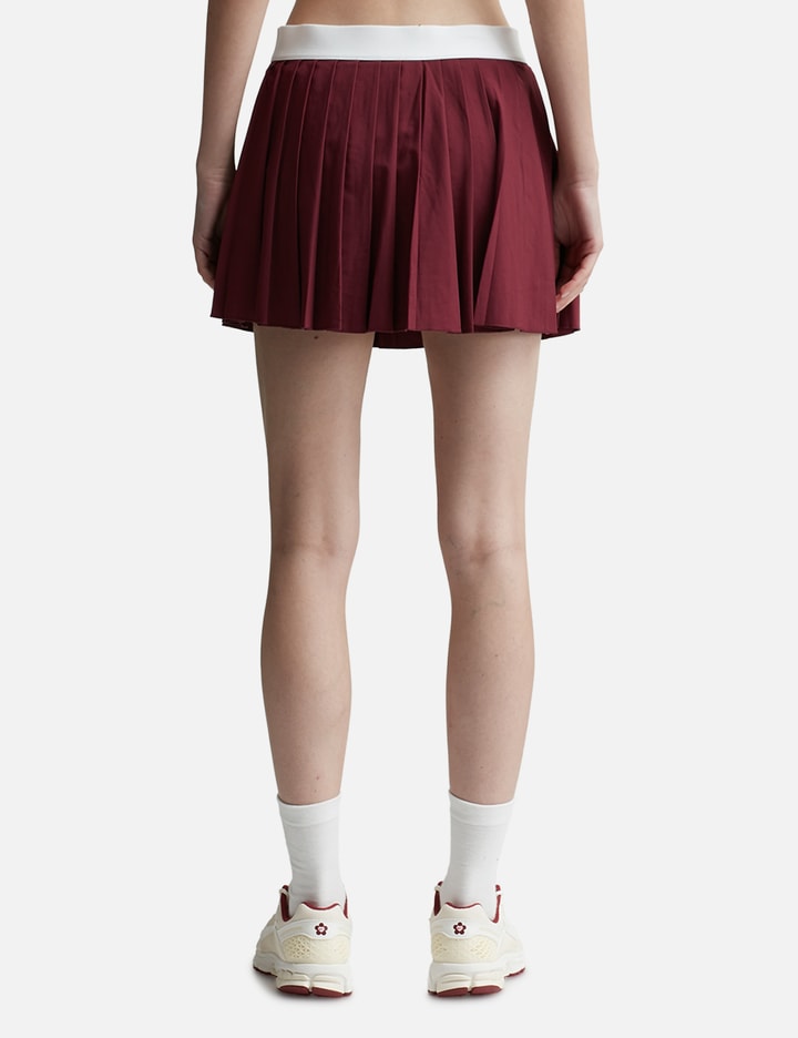 Shop Sporty &amp; Rich Classic Logo Pleated Skirt In Red
