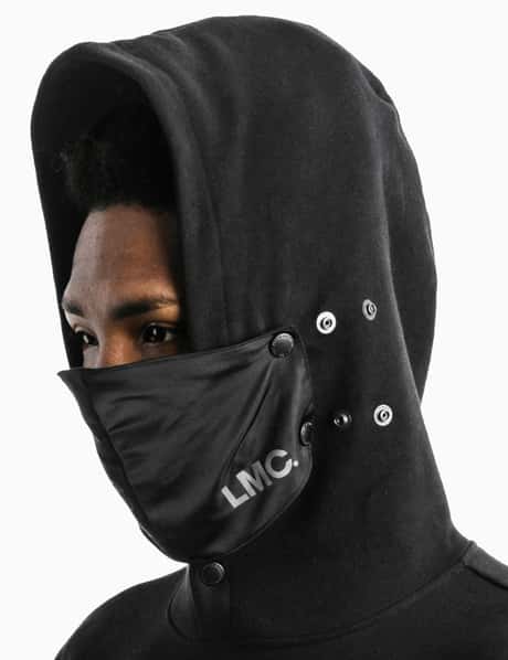 LMC - LMC X Pleasures Saint Technical Oversized Hoodie | HBX  