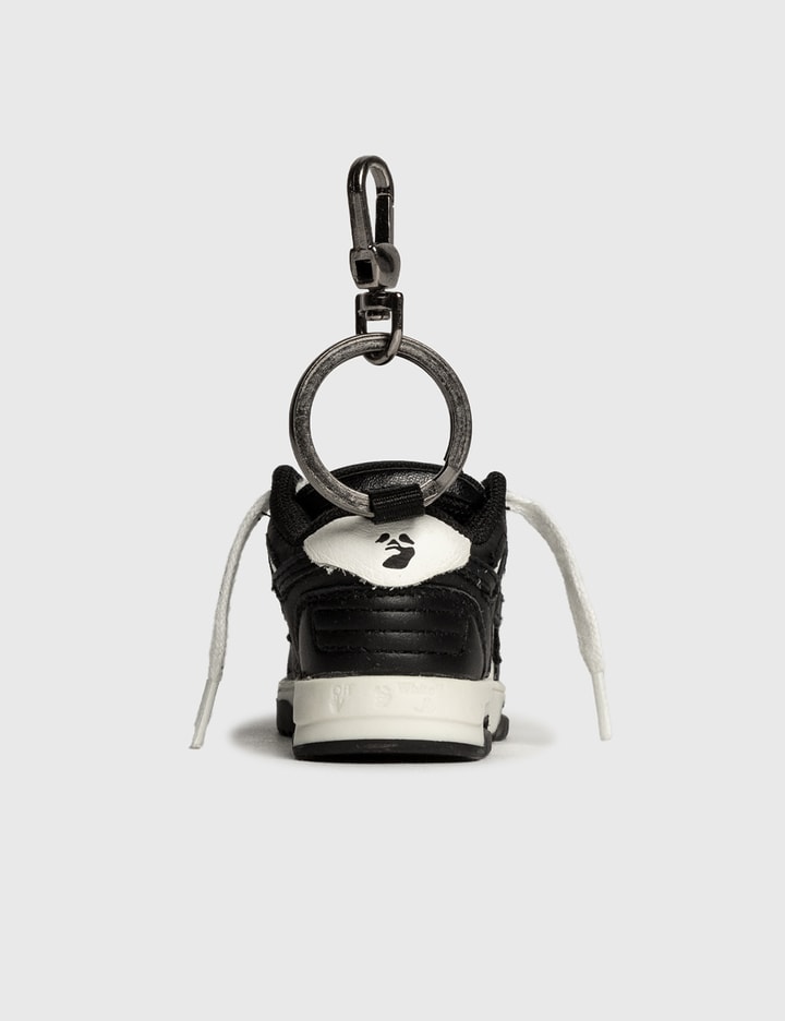 Off-White™ - 'Ooo' Keychain  HBX - Globally Curated Fashion and Lifestyle  by Hypebeast