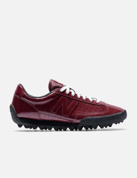 New Balance Gator Run - Red leather sneakers with debossed crocodile print  | HBX