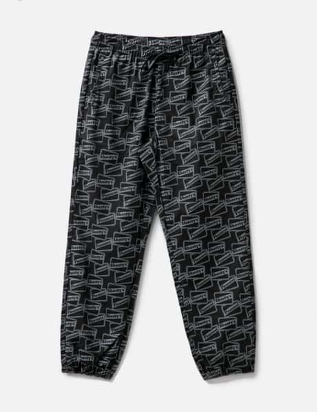 Pleasures REFLECTIVE TRACK PANTS