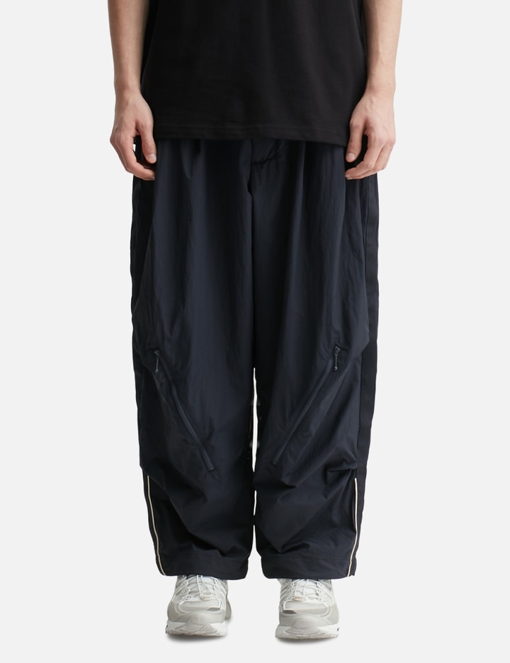 GOOPiMADE®  x Subcrew “RGW-01P” EDG(Y)BUG Grid System Track Pants Placeholder Image