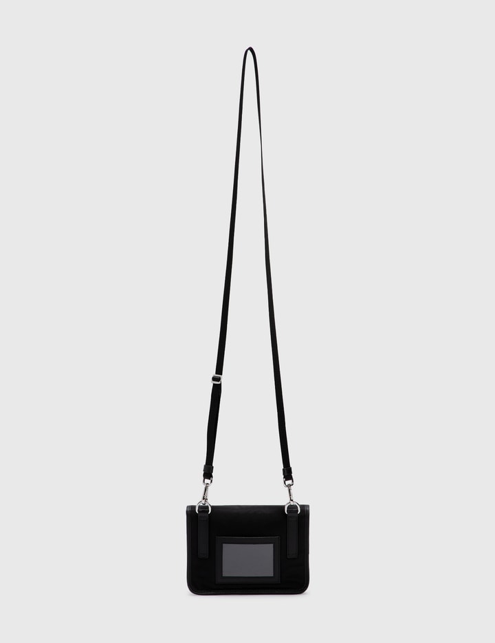 Buy the Calvin Klein Saffiano Leather Mini Push Lock Crossbody