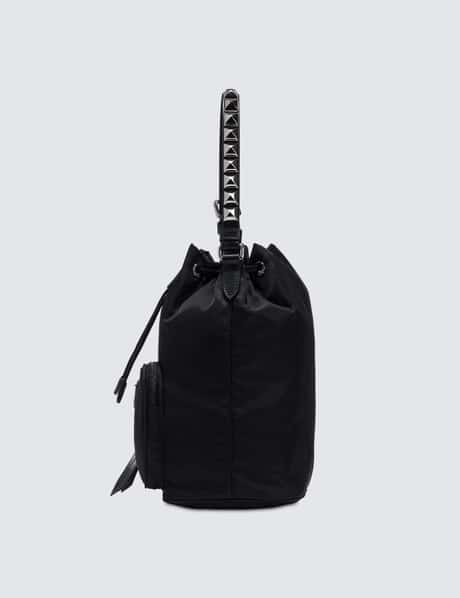 Prada - Nylon Studded Bucket Bag  HBX - Globally Curated Fashion and  Lifestyle by Hypebeast
