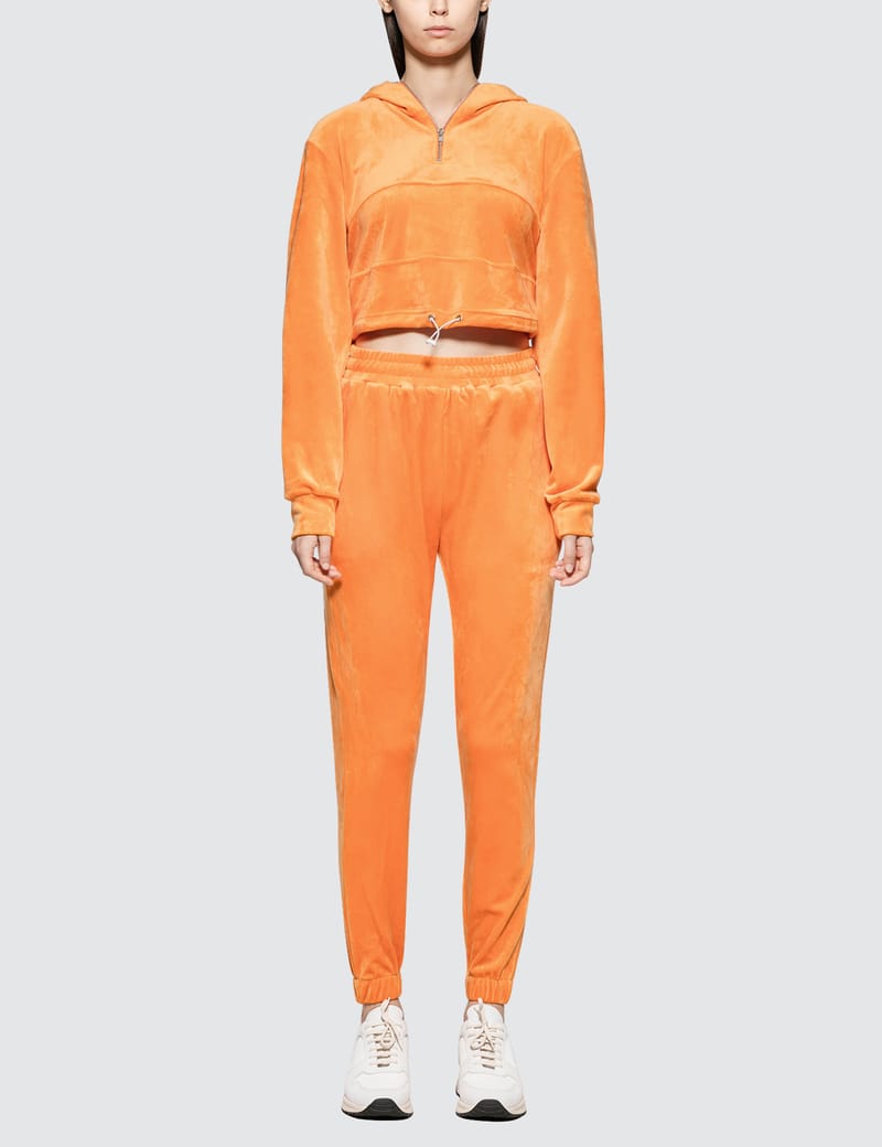 orange velvet tracksuit