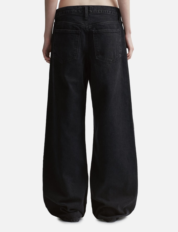 Shop Agolde Clara Low Rise Baggy Flare Jeans In Black