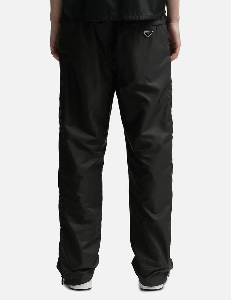 Prada - RE-NYLON SIDE ZIP PANTS | HBX - Globally Curated Fashion and  Lifestyle by Hypebeast