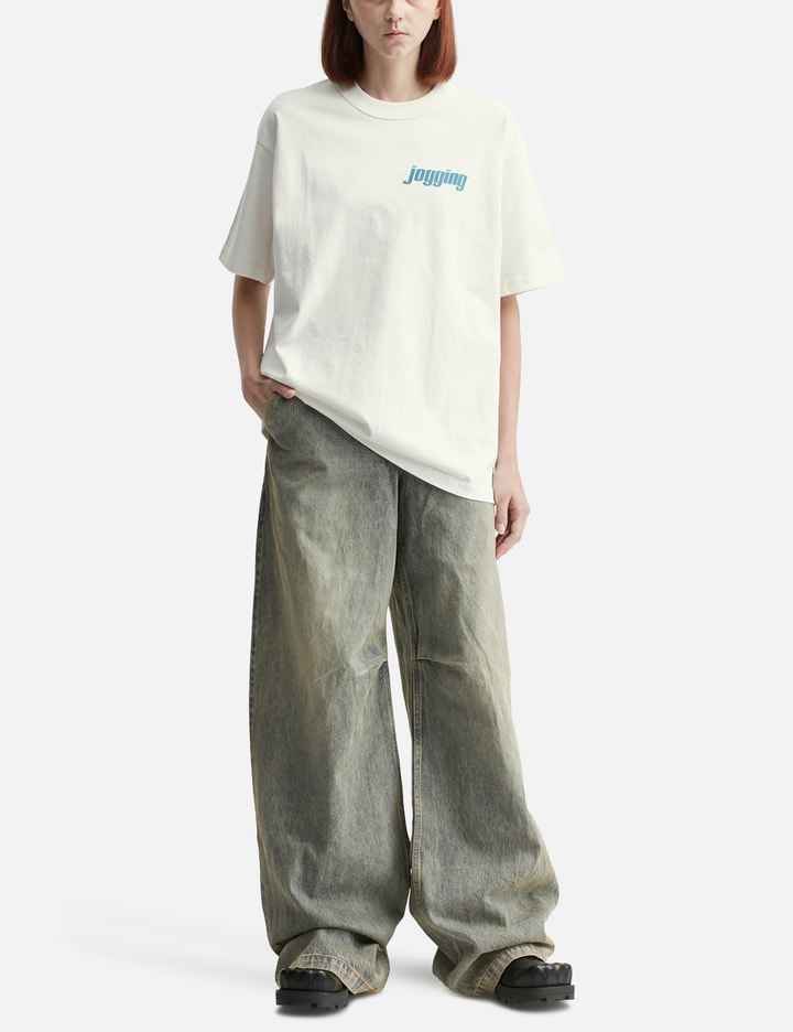 Unlikely Authentic Graphic Tee "Jogging" Placeholder Image