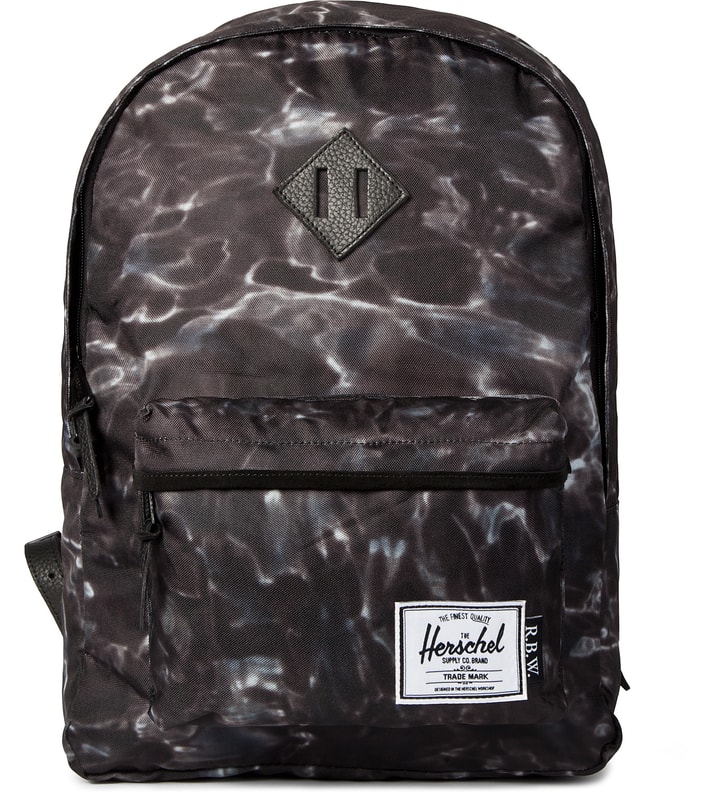 Raised by Wolves x Herschel Supply Co. Water Camo Woodlands Backpack  Placeholder Image