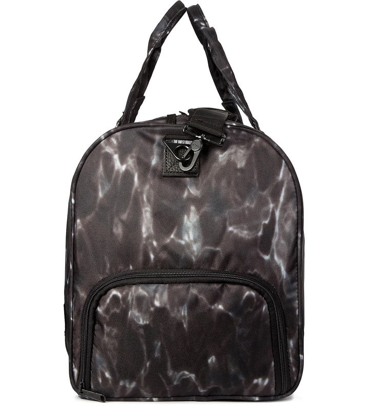 Raised by Wolves x Herschel Supply Co. Water Camo Novel Duffle Bag  Placeholder Image
