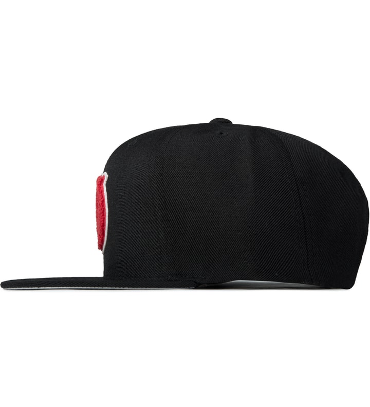Black Cursive D Cap  Placeholder Image