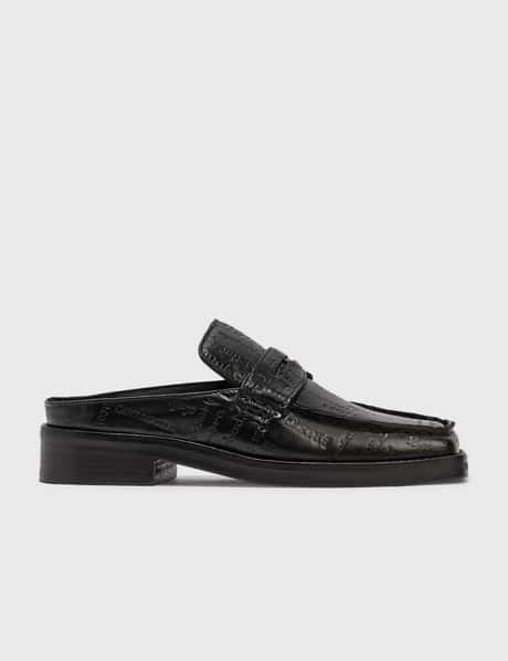 Martine Rose - Arches Embossed Text Loafers | HBX - Globally 