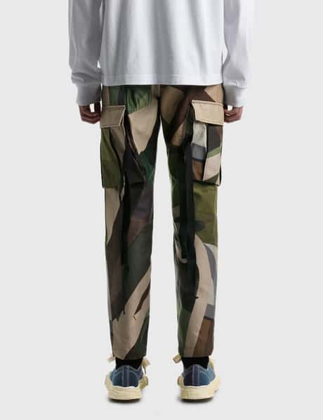 Sacai - KAWS Print Pants | HBX